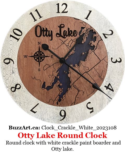 Round clock with white crackle paint boarder and Otty lake.